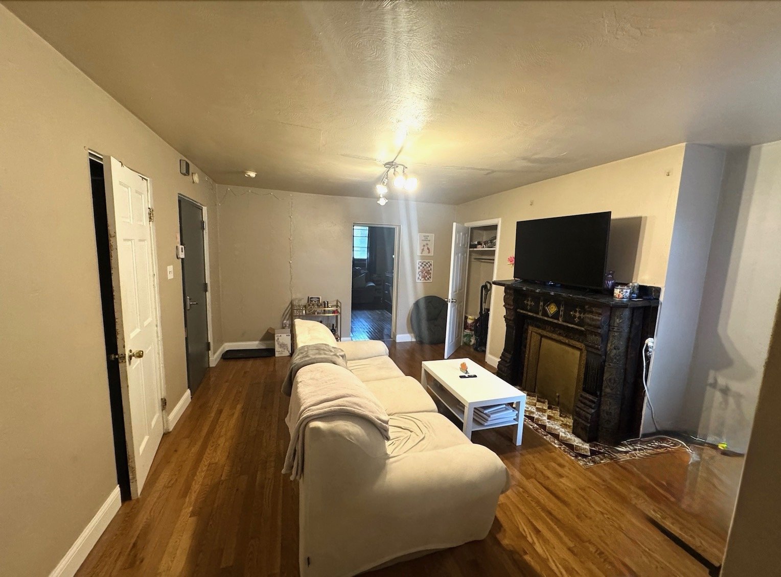 Welcoming living room at 340 Atwood St #1 with a sofa and hardwood floors